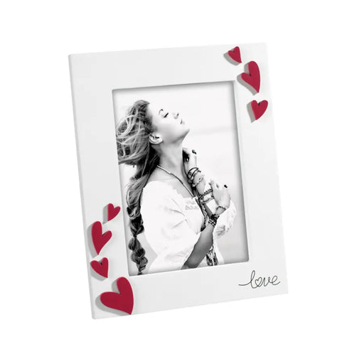 Portafoto Mascagni A2045 in MDF colore rosso, formato 13×18. Design moderno e brillante, ideale per dare carattere a ogni ambiente. Prodotto nuovo e originale.